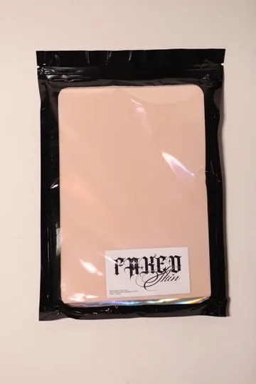 FAKED SKIN practice pad in its labelled black package
